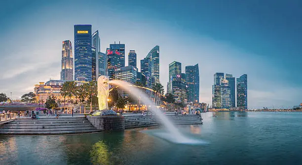 Pristine white sands and turquoise waters at Siloso Beach on Sentosa Island, inviting visitors to relax and enjoy the tropical paradise of Singapore.