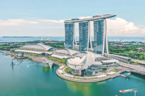 Tranquil reservoir views at Bukit Batok Nature Park, Singapore, showcasing serene waters surrounded by lush greenery, offering a peaceful escape and scenic beauty amidst nature's embrace.