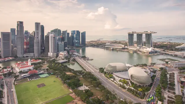 Scenic walking trail amidst lush greenery at Bukit Batok Nature Park, Singapore, providing a serene setting for leisurely strolls and nature exploration, surrounded by tranquil landscapes and diverse ecosystems.